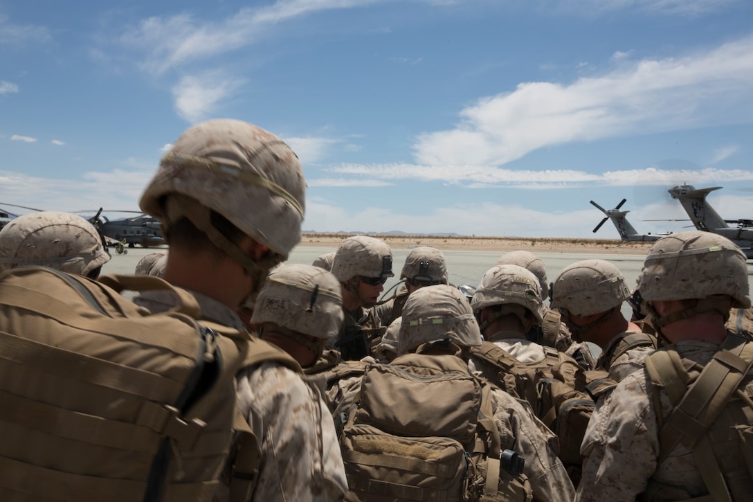 U.S. Marine Corps 1st Lt. David Williams, platoon commander with 1st Platoon, Company A, 1st Battalion, 7th Marine Regiment, delivers a safety brief before conducting a tactical recovery of aircraft and personnel mission in response to a scenario-based incident during an Integrated Training Exercise (ITX) aboard Marine Corps Air Ground Combat Center Twentynine Palms, Calif., Aug. 1, 2015. ITX is conducted to enhance the integration and warfighting capability from all elements of the Marine Air Ground Task Force (U.S. Marine Corps photo by Lance Cpl. Clarence A. Leake/Released)