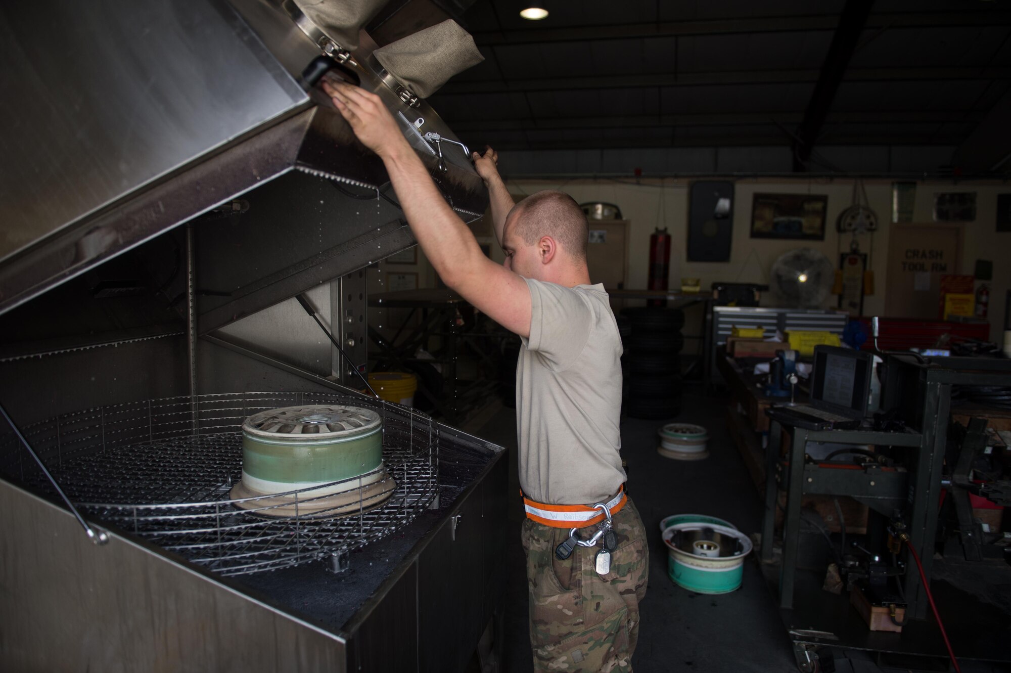 U.S. Air Force Staff Sgt. William “Willy” Reibsome III, 455th Expeditionary Maintenance Squadron wheel and tire noncommissioned officer in charge, cleans and inspects an F-16 Fighting Falcon aircraft wheel at Bagram Airfield, Afghanistan, Aug. 2, 2015. Reibsome ensures that F-16s at BAF have serviceable tires to complete the combat airpower mission; on average he works 70 wheels per month. (U.S. Air Force photo by Tech. Sgt. Joseph Swafford/Released)