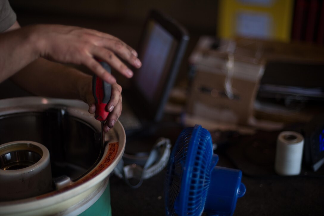 U.S. Air Force Staff Sgt. William “Willy” Reibsome III, 455th Expeditionary Maintenance Squadron wheel and tire noncommissioned officer in charge, cleans and inspects an F-16 Fighting Falcon aircraft wheel at Bagram Airfield, Afghanistan, Aug. 2, 2015. Reibsome ensures that F-16s at BAF have serviceable tires to complete the combat airpower mission; on average he works 70 wheels per month. (U.S. Air Force photo by Tech. Sgt. Joseph Swafford/Released)