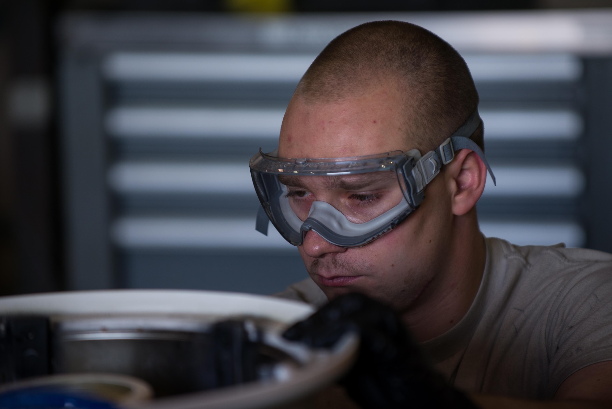 U.S. Air Force Staff Sgt. William “Willy” Reibsome III, 455th Expeditionary Maintenance Squadron wheel and tire noncommissioned officer in charge, cleans and inspects an F-16 Fighting Falcon aircraft wheel at Bagram Airfield, Afghanistan, Aug. 2, 2015. Reibsome ensures that F-16s at BAF have serviceable tires to complete the combat airpower mission; on average he works 70 wheels per month. (U.S. Air Force photo by Tech. Sgt. Joseph Swafford/Released)