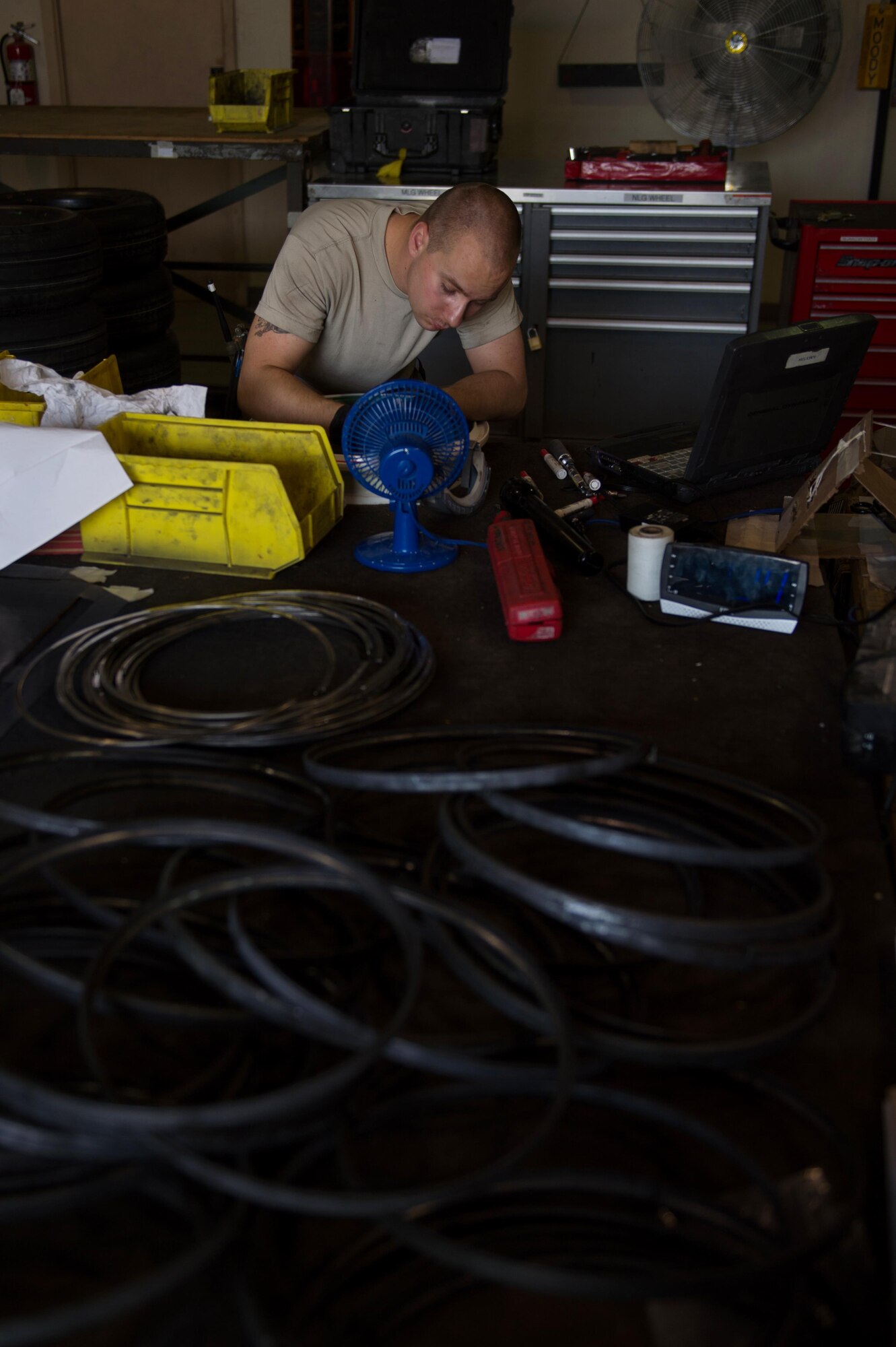 U.S. Air Force Staff Sgt. William “Willy” Reibsome III, 455th Expeditionary Maintenance Squadron wheel and tire noncommissioned officer in charge, cleans and inspects an F-16 Fighting Falcon aircraft wheel at Bagram Airfield, Afghanistan, Aug. 2, 2015. Reibsome ensures that F-16s at BAF have serviceable tires to complete the combat airpower mission; on average he works 70 wheels per month. (U.S. Air Force photo by Tech. Sgt. Joseph Swafford/Released)