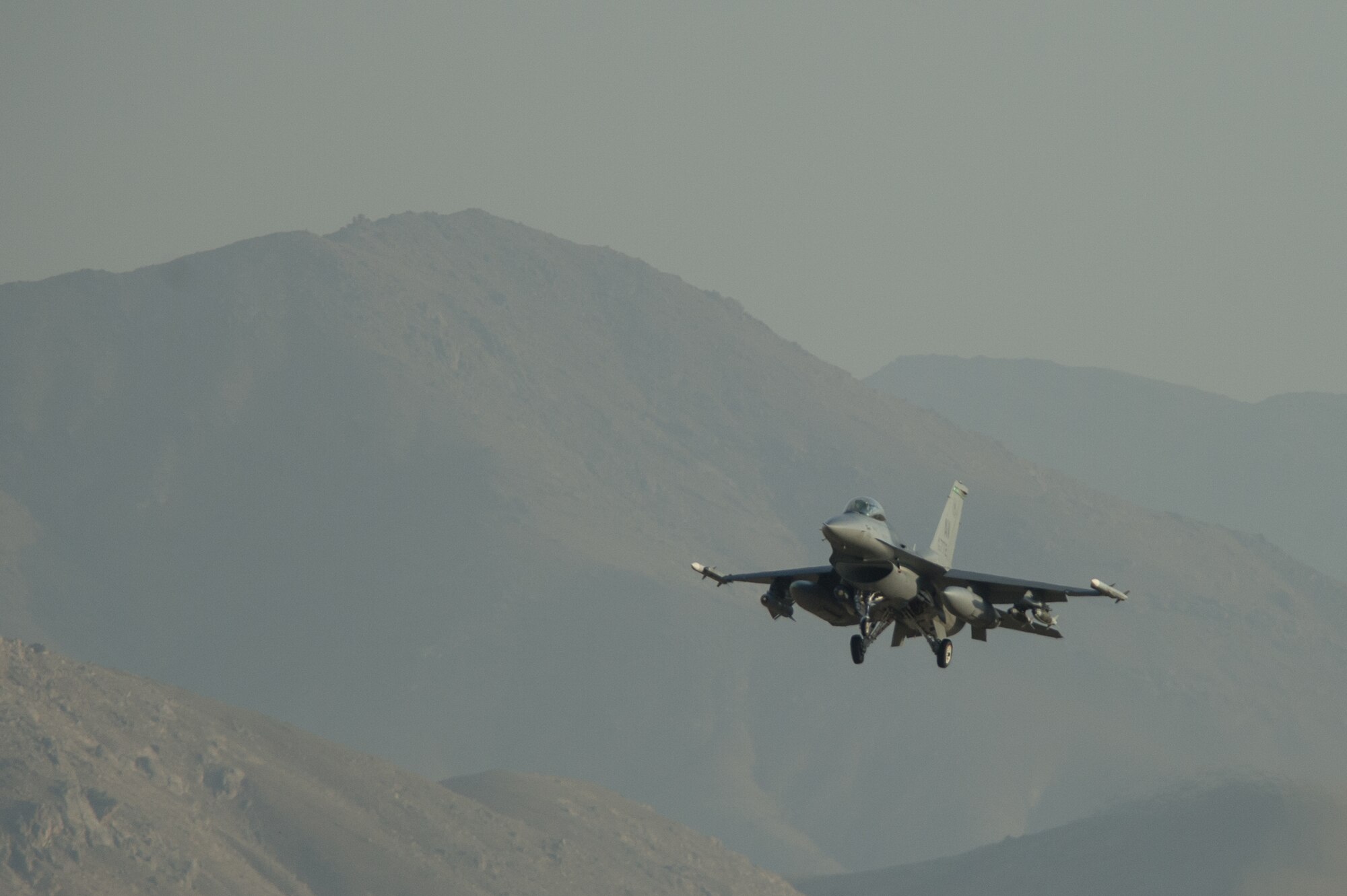 A U.S. Air Force F-16 Fighting Falcon aircraft lands at Bagram Airfield, Afghanistan, Aug. 3, 2015. The 455th Expeditionary Maintenance Squadron wheel and tire shop ensures that F-16s at BAF have serviceable tires to complete the combat airpower mission. (U.S. Air Force photo by Tech. Sgt. Joseph Swafford/Released)