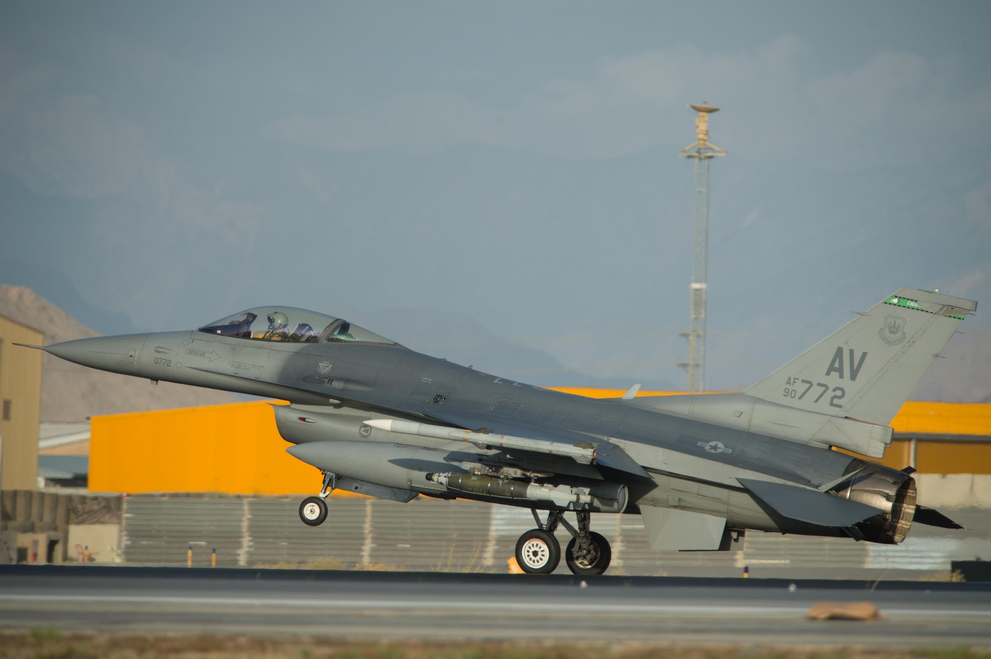 A U.S. Air Force F-16 Fighting Falcon aircraft lands at Bagram Airfield, Afghanistan, Aug. 3, 2015. The 455th Expeditionary Maintenance Squadron wheel and tire shop ensures that F-16s at BAF have serviceable tires to complete the combat airpower mission. (U.S. Air Force photo by Tech. Sgt. Joseph Swafford/Released)