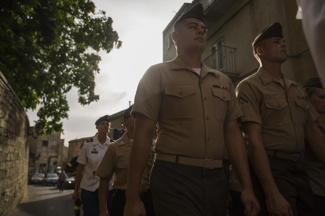 Marines with Special-Purpose Marine Air-Ground Task Force Crisis Response-Africa, Detachment A, march during the Battle of Troina remembrance ceremony, August 2, 2015. This was the first time since 1959 that American military was represented at the commemoration’s events to include a mass at the Cathedral of Maria SS Annunziata and wreath-laying ceremony. (U.S. Marine Corps photo by Cpl. Olivia McDonald/Released)