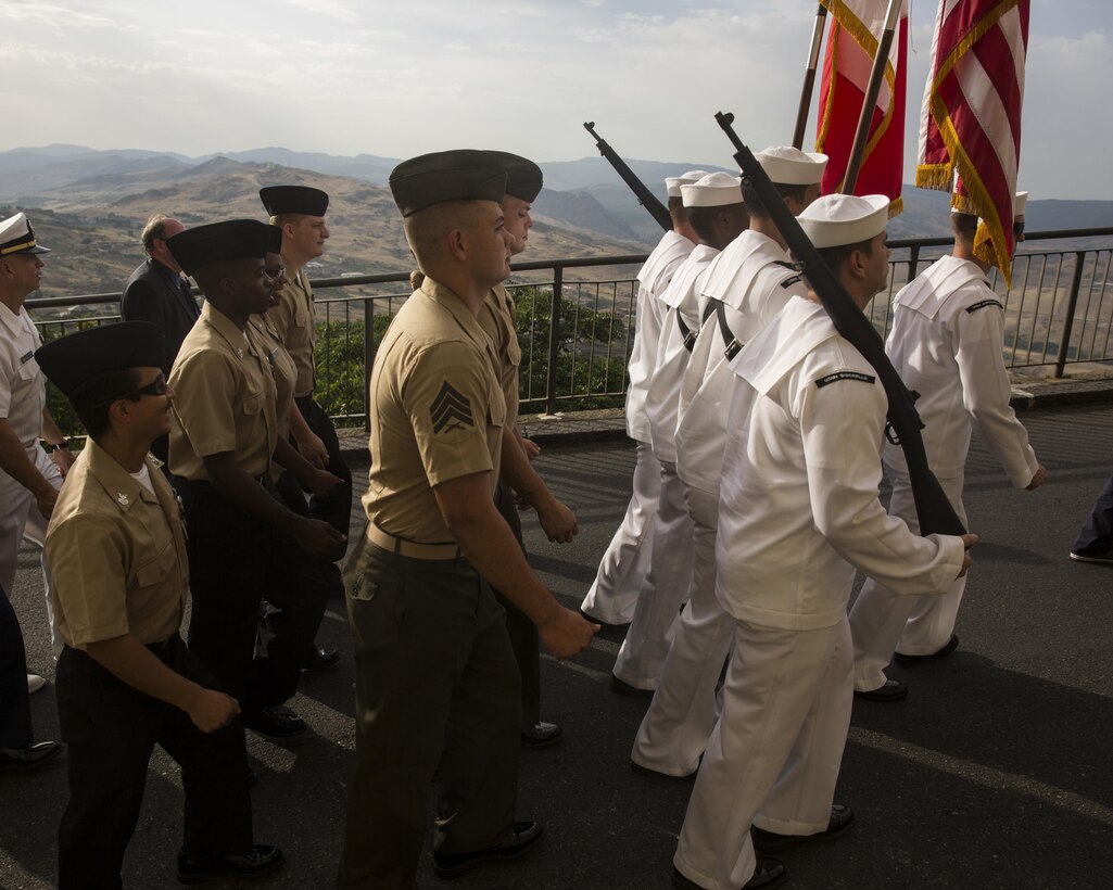 Marines and sailors with the Special-Purpose Marine Air-Ground Task Force Crisis Response-Africa, Detachment A, march in a parade during a World War II remembrance ceremony in Troina, Sicily, Italy, August 2, 2015. The day’s events were in remembrance of the lives lost during the Battle of Troina and in honor of those who fought to liberate the town from Nazi control. (U.S. Marine Corps photo by Cpl. Olivia McDonald/Released)