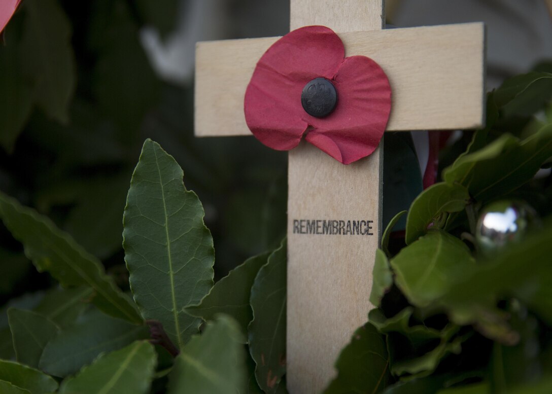 The word “remembrance” is written on a cross within the wreath laid during a ceremony in honor of the loss and sacrifice of the Battle of Troina in World War Two in Troina, Sicily, Italy, August 2, 2015. Marines and sailors with Special-Purpose Marine Air-Ground Task Force Crisis Response-Africa, Detachment A, participated in the town’s ceremonial events remembering the shared history and sacrifice of the two countries who faced a harsh Nazi resistance during the battle. (U.S. Marine Corps photo by Cpl. Olivia McDonald/Released)