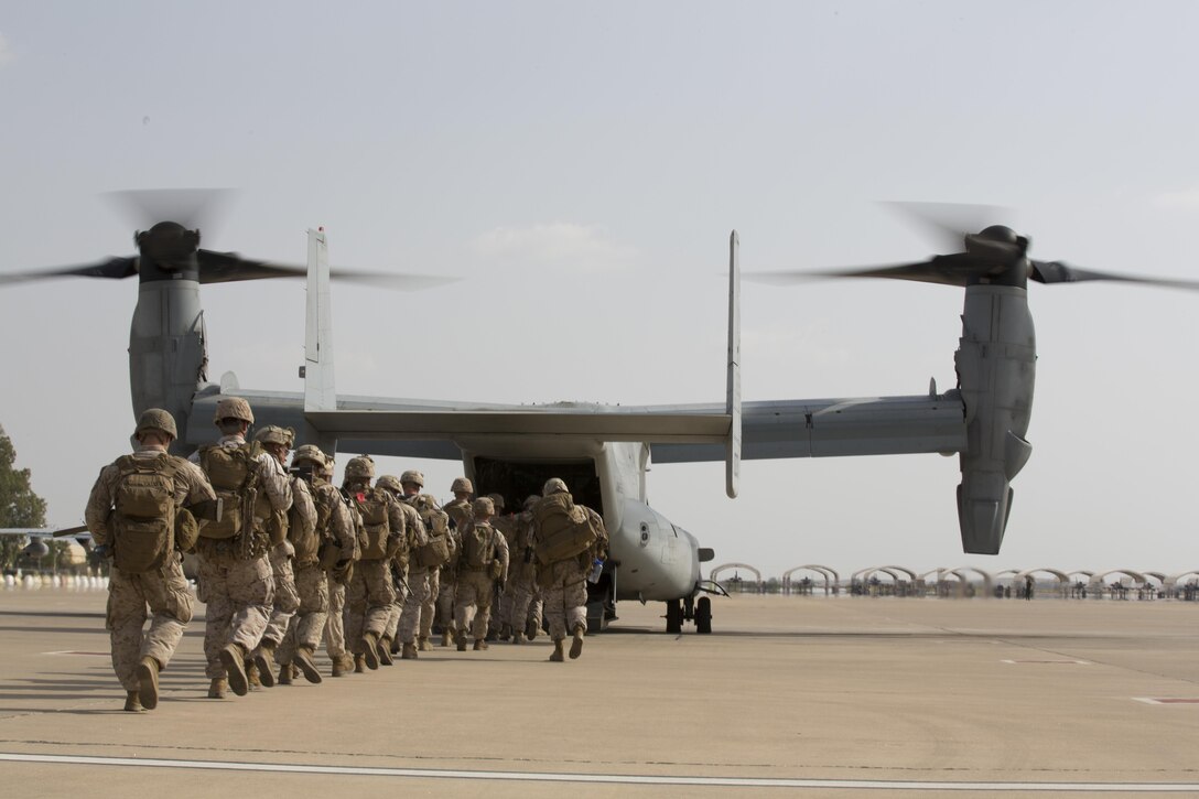 U.S. Marines with Special-Purpose Marine Air-Ground Task Force Crisis Response-Africa (SPMAGTF-CR-AF), board an MV-22B Osprey, during a crisis response drill on Morón Air Base, Spain, Aug. 3, 2015. The crisis response force’s mission requires them to have Marines ready to respond within six hours of an alert in support U.S. Africa Command. (U.S. Marine Corps photo by Staff Sgt. Keonaona C. Paulo/Released)