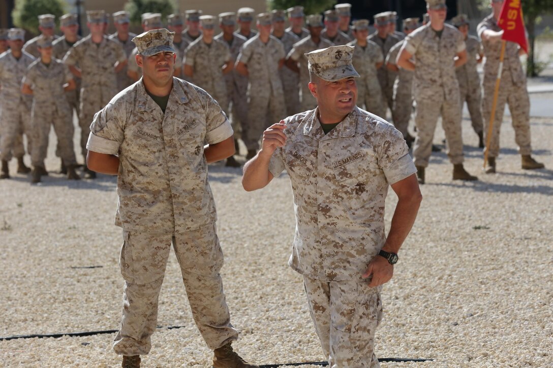 Marine Wing Support Squadron 272 commanding officer Lt. Col. Alfredo DuBois speaks to Marines with MWSS-272 and Combat Logistics Battalion 6 during the Special-Purpose Marine Air-Ground Task Force Crisis Response-Africa Detachment A transfer of authority ceremony, July 30, aboard Naval Air Station Sigonella, Italy. Combat Logistics Battalion 6 replaced MWSS-272 as SPMAGTF-CR-AF Det. A. The battalion will be responsible for executing theater security cooperation missions across the African continent. The Marines, sailors and Coast Guardsmen of SPMAGTF-CR-AF will work with partner nations to develop stronger relationships and increase stability across the continent by increasing the capabilities of the host nation militaries. The training will encompass everything from teaching host nation militaries infantry tactics and small-boat operations to convoy operations and vertical engineering.