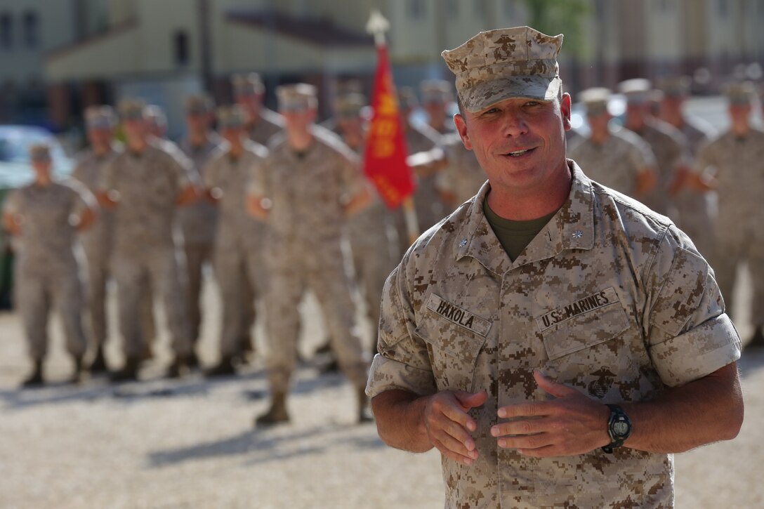 Combat Logistics Battalion 6 commanding officer Lt. Col. Matthew B. Hakola speaks to Marines with MWSS-272 andCLB-6 during the Special-Purpose Marine Air-Ground Task Force Crisis Response-Africa Detachment A transfer of authority ceremony, July 30, aboard Naval Air Station Sigonella, Sicily, Italy. Combat Logistics Battalion 6 replaced MWSS-272 as the SPMAGTF-CR-AF LCE. The battalion will be responsible for executing theater security cooperation missions across the African continent. The Marines, sailors and Coast Guardsmen of SPMAGTF-CR-AF will work with partner nations to develop stronger relationships and increase stability across the continent by increasing the capabilities of the host nation militaries. The training will encompass everything from teaching host nation militaries infantry tactics and small-boat operations to convoy operations and vertical engineering.