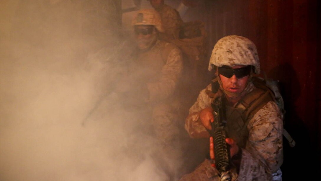 U.S. Navy corpsmen and Marines, assigned to various units in the 1st Marine Division, conduct tactical combat casualty care training during the Combat Trauma Management Course, taught by instructors with the 1st Mar. Div. Navy Education and Training Office, at the Strategic Operations facility, San Diego, July 30, 2015. The course, held once a month for 40 students, combines simulated injuries on role players and chaotic battlefield environments to prepare corpsmen and Marine combat life savers for the stress of saving lives in real world operations.  