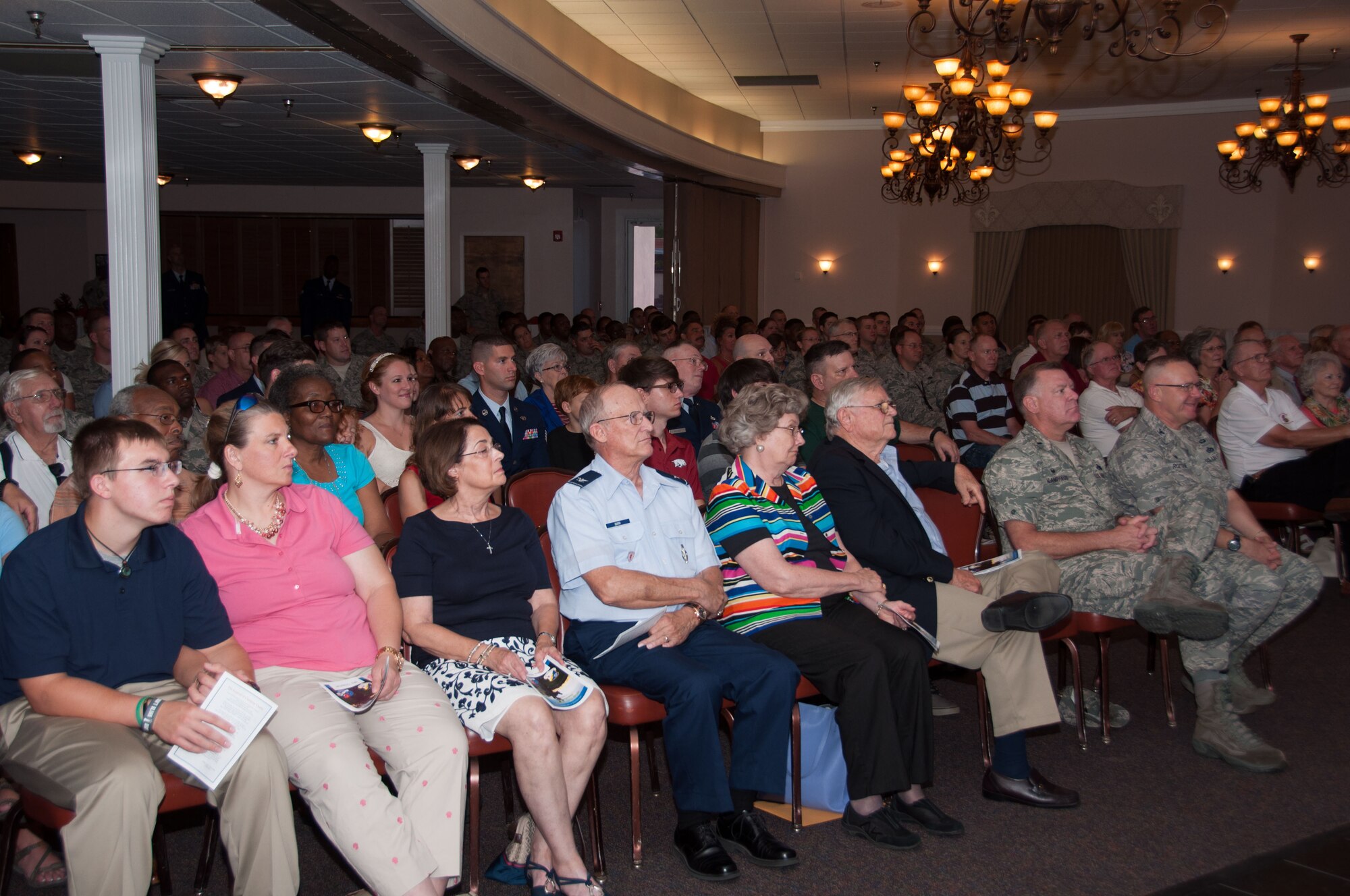 Past and present members of the 307th RED HORSE Squadron gather for the squadron’s inactivation ceremony on Aug. 2, 2015 Barksdale Air Force Base, La. The 307th RED HORSE Squadron was the oldest continuously operational RED HORSE Squadron in the Air Force. The squadron opened in July of 1971 and inactivates Aug. 31, 2015. (U.S. Air Force photo by Master Sgt. Laura Siebert)