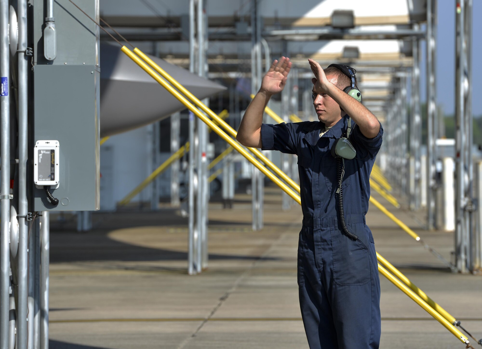 Airman 1st Class Zachary Weeks, 33rd Aircraft Maintenance Squadron crew chief, taxis an F-35A Lighting II forward at Eglin Air Force Base, Fla., August 4, 2015. Week’s responsibility on the flight line is to safely inspect and launch the F-35A Lighting II. (U.S. Air Force Photo/Senior Airman Andrea Posey)