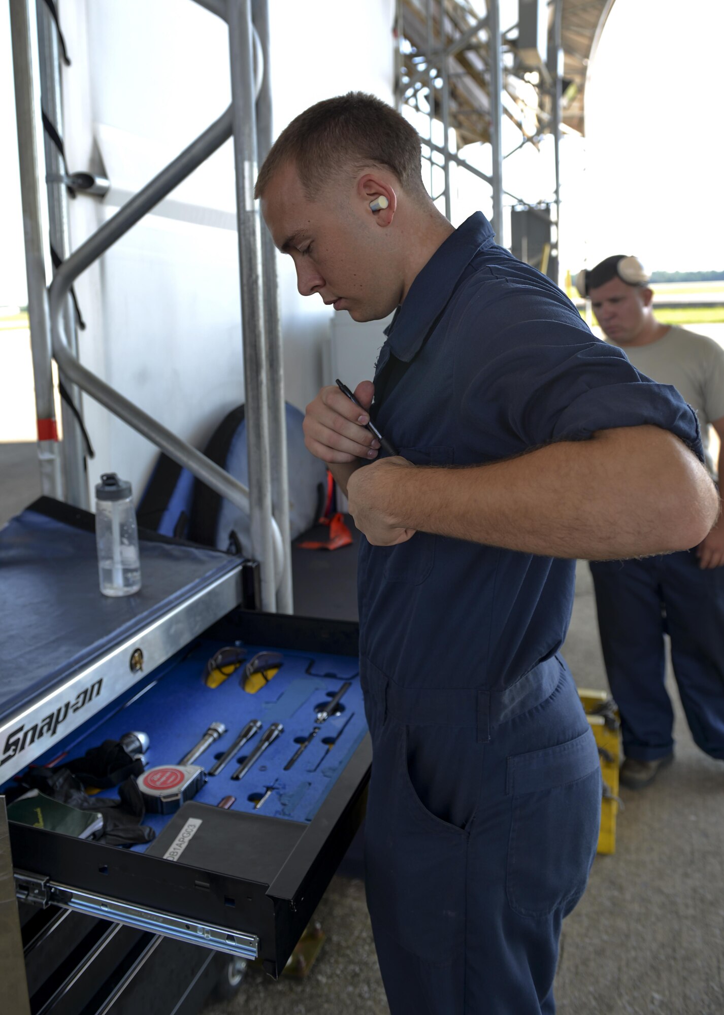 Airman 1st Class Zachary Weeks, 33rd Aircraft Maintenance Squadron crew chief, stores his tools in an Aerospace propulsion general maxi at Eglin Air Force Base, Fla., August 4, 2015. Week’s responsibility on the flight line is to safely inspect and launch the F-35A Lighting II. (U.S. Air Force Photo/Senior Airman Andrea Posey)