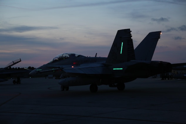 A F-A/18D Hornet taxis down the runway aboard Marine Corps Air Station Beaufort July 30. The jet is preparing to execute a night flight as part of  the Palmetto Fire Exercise. The exercise is a joint service exercise utilizing Marine Corps, Navy, and Air Force aircraft. The aircraft is a part of Marine All-Weather Fighter Attack Squadron 224, Marine Aircraft Group 31. (U.S. Marine Corps photo by Lance Cpl. Samantha K. Torres/released)

