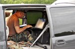 Members of the Virginia Defense Force Incident Management Assistance Team in
Onancock prepare for possible duty in response to Hurricane Irene on Aug. 26,
2011, by setting up a TAC-PAC to provide communication between Virginia
National Guard Soldiers on duty across the commonwealth. The Virginia
National Guard has been authorized to bring up to 300 personnel on state
active duty for possible missions including high water transport and light
debris removal.