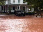 New York National Guard Soldiers rescue a family in Windham, N.Y., after Hurricane Irene.