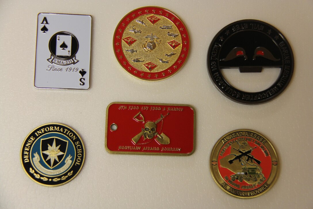 A small collection out of 33 unique challenge coins curated by The National Museum of the Marine Corps, July 20, aboard Marine Corps Base Quantico.