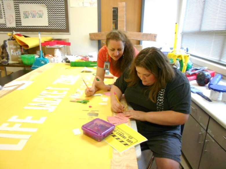 The U.S. Army Corps of Engineers Galveston District, together with Bay City High School Art Teacher Sharon Landgrebe and her students, coordinated a project to create signs to alert the public about the need to wear life jackets when they are in, on or around water. 