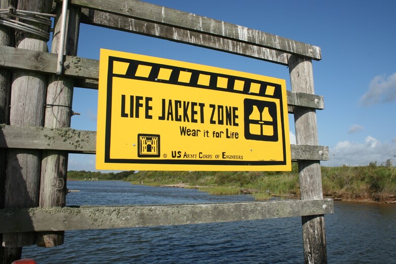 The U.S. Army Corps of Engineers Galveston District, together with Bay City High School Art Teacher Sharon Landgrebe and her students, coordinated a project to create signs to alert the public about the need to wear life jackets when they are in, on or around water. 