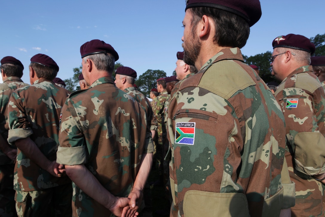 South African paratroopers stand in formation as they wait to compete during Leapfest 2015 in West Kingston, R.I., Aug. 1, 2015.