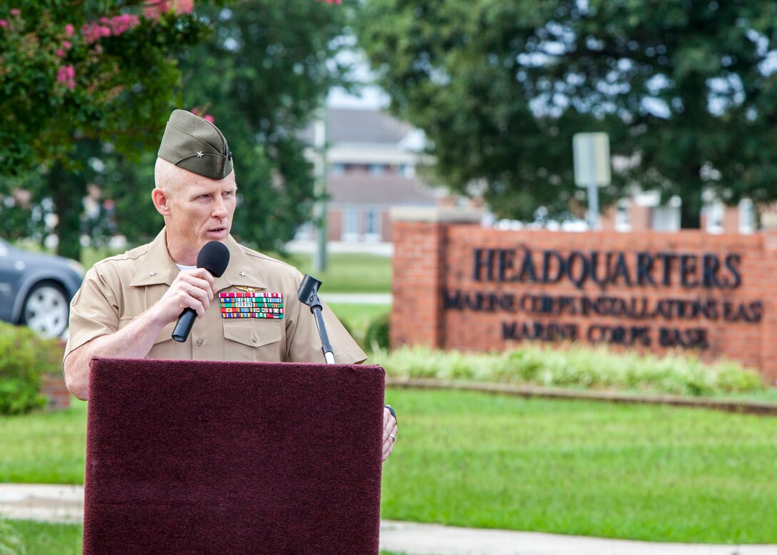 U.S. Marine Corps Brig. Gen. Thomas D. Weidley, commanding general of Marine Corps Installations East-Marine Corps Base Camp Lejeune, welcomes veterans of the 4th Marine Division and their families at the installation headquarters building on Camp Lejeune, N.C., Aug. 4, 2015. 