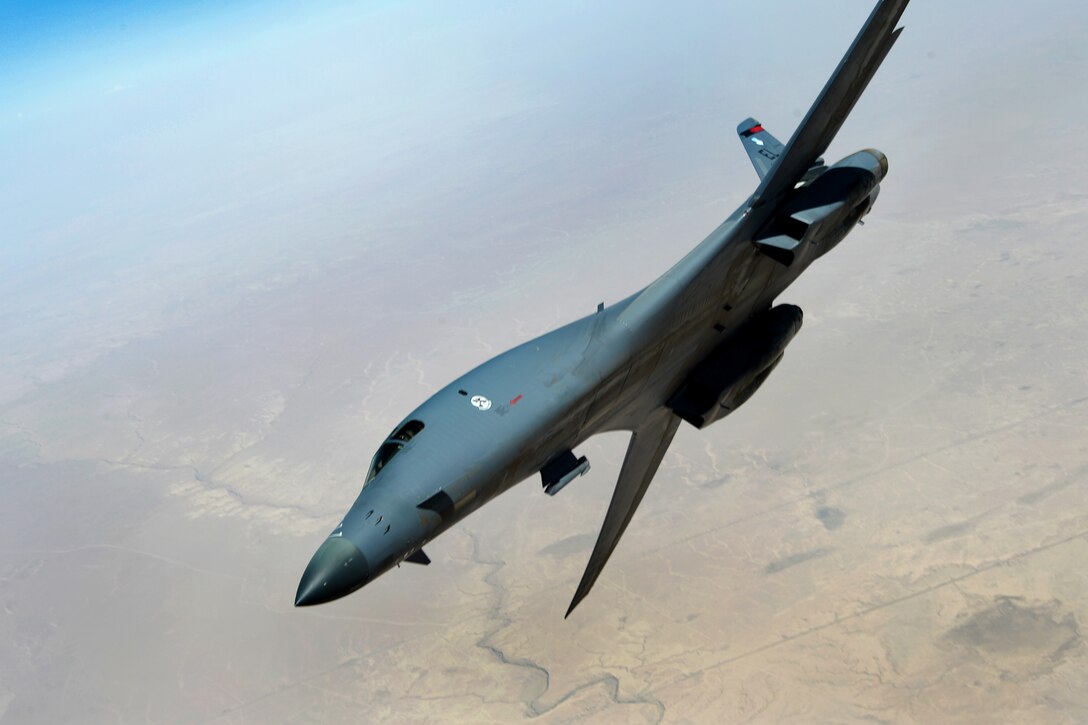 A U.S. Air Force B-1B Lancer departs after refueling from a USAF KC-135 Stratotanker over Southwest Asia during a mission in support of Operation Inherent Resolve, July 23, 2015.