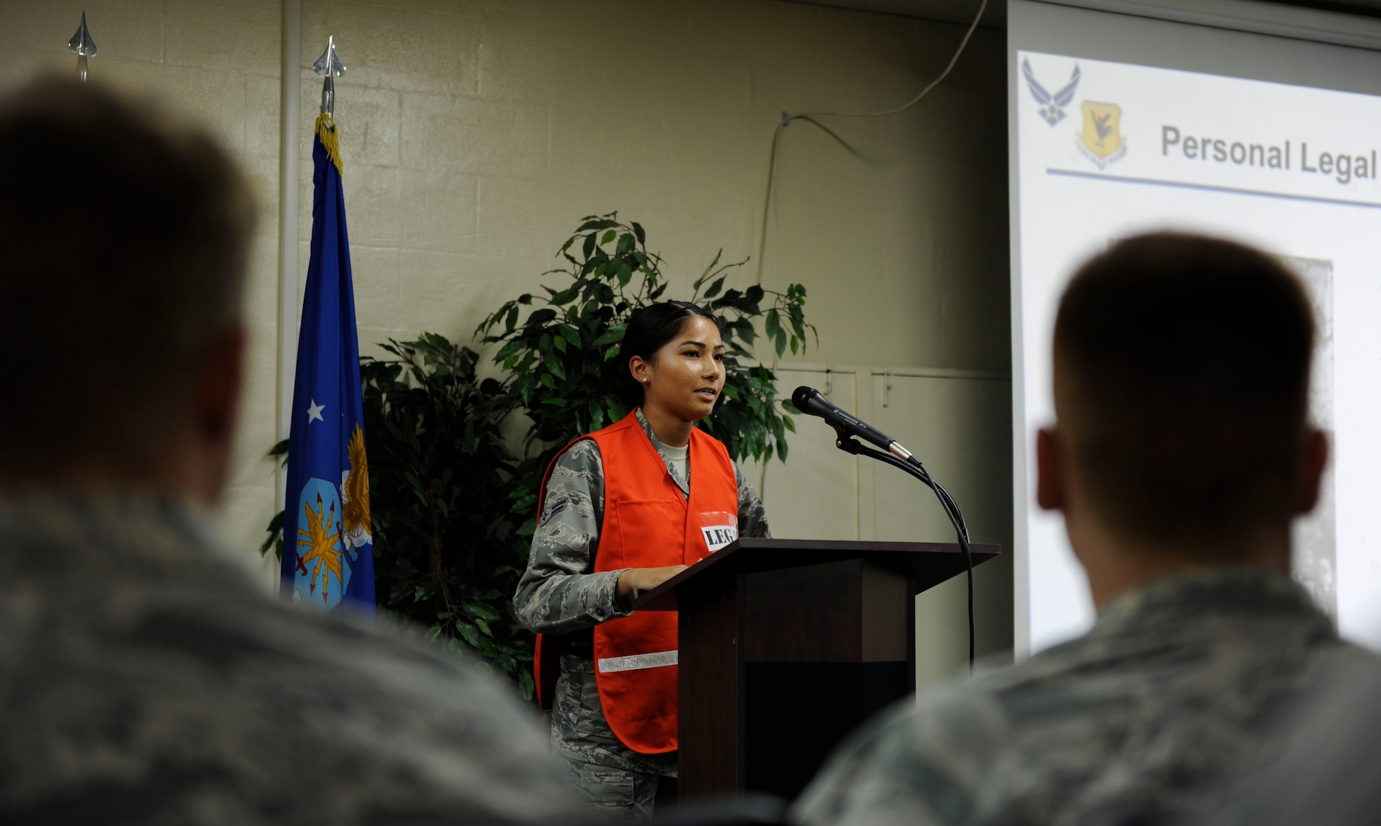 U.S. Air Force Airman 1st Class Estrella Breazell, 18th Legal Office civil law paralegal, delivers a legal briefing for Mission-Focused Exercise participants on Kadena Air Base, Japan Aug. 4, 2015. MFEs test Airmen’s ability to deploy forces and cargo while maintaining mission proficiency in a simulated environment. (U.S. Air Force photo by Airman 1st Class Lynette Rolen)