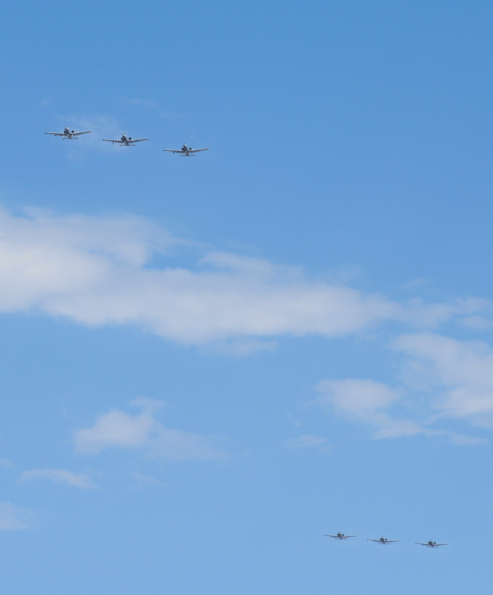 Six A-10C Thunderbolt IIs from the 354th Fighter Squadron, fly in formation over Davis-Monthan Air Force Base, Ariz., after a six month deployment to Europe, Aug. 4, 2015. The 354th FS participated in 21 exercises, compiling more than 1,500 flying missions and nearly 2,700 flight hours while engaging with 22 countries while deployed. (U.S. Air Force photo by Airman 1st Class Ashley N. Steffen/ Released)