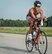 Maj. Christina Hopper bikes during the Ironman 70.3 Muncie at Muncie, Indiana, July 11. Hopper completed her 56-mile bike ride in 2:44:29. (Courtesy photo / finisherpix)