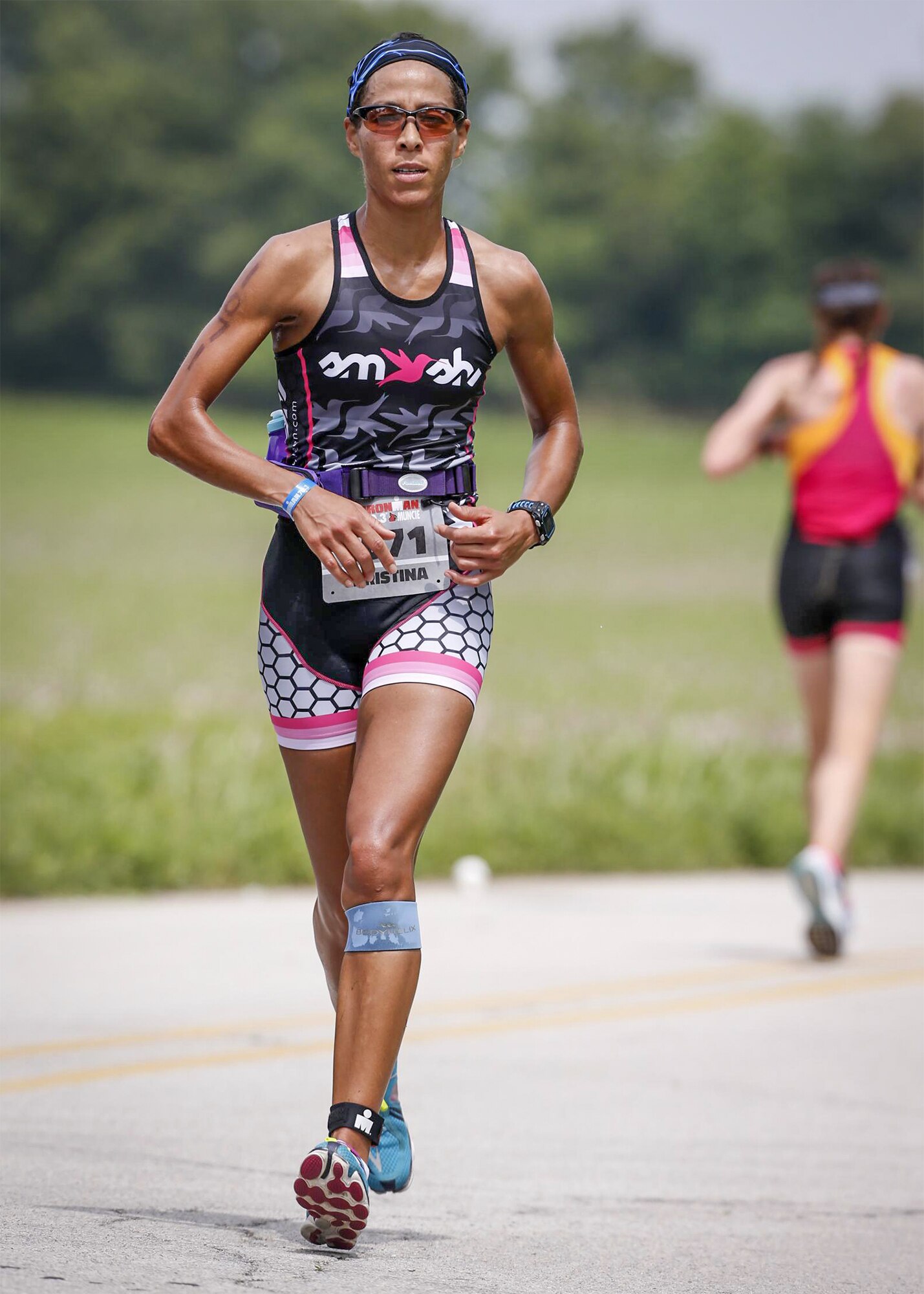 Maj. Christina Hopper runs during the Ironman 70.3 Muncie at Muncie, Indiana, July 11. Hopper completed her 13.1-mile run in 1:46:40. (Courtesy photo / finisherpix)