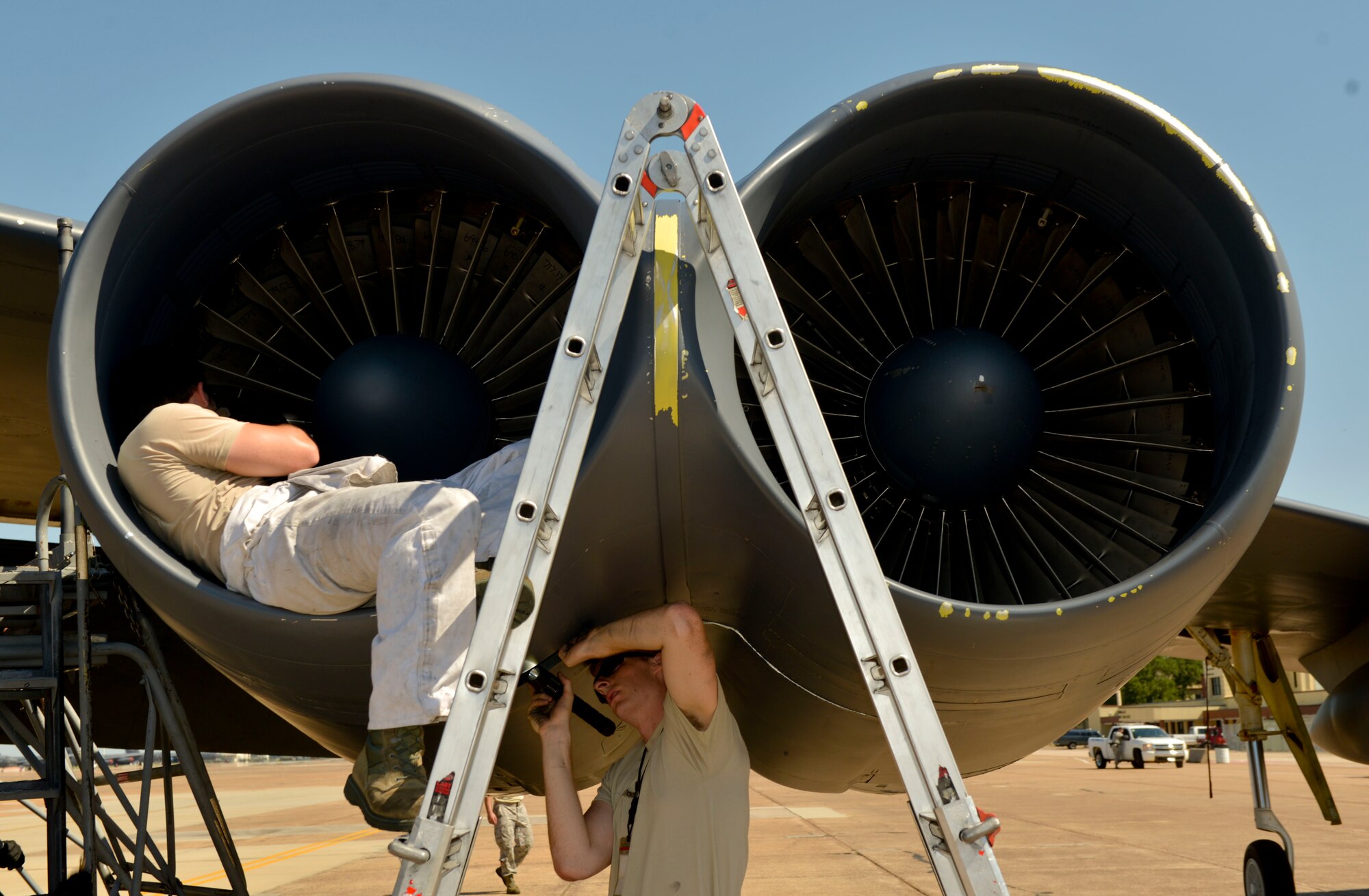 Airmen with the 96th Aircraft Maintenance Squadron inspect a B-52 Stratofortress engine at Barksdale Air Force Base, La., Aug. 1, 2015 after the aircraft arrived home from a mission. The B-52 is capable of combining and delivering long range, large payload and precision attack. (U.S. Air Force photo/Airman 1st Class Mozer O. Da Cunha)

