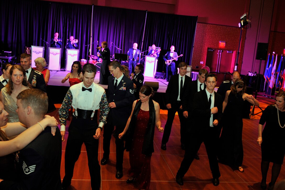 Vortex performing at the 55th Wing Birthday Ball having a good time with fellow airmen