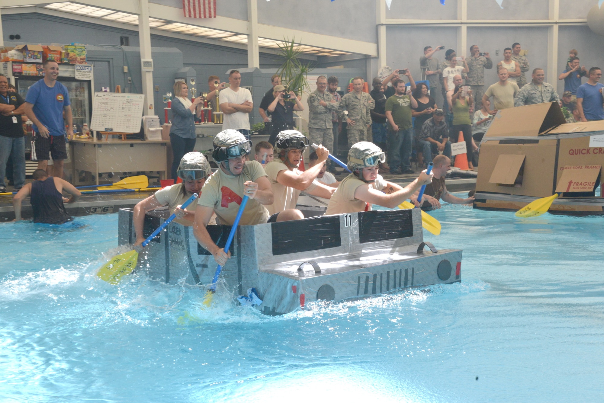 Kirtland’s annual Battle of the Battleships, which takes place Aug. 7 at the Mountain View Club pool, will pit teams of Airmen against each other as they race boats made only of cardboard and duct tape. (Photo by Dennis Carlson)
