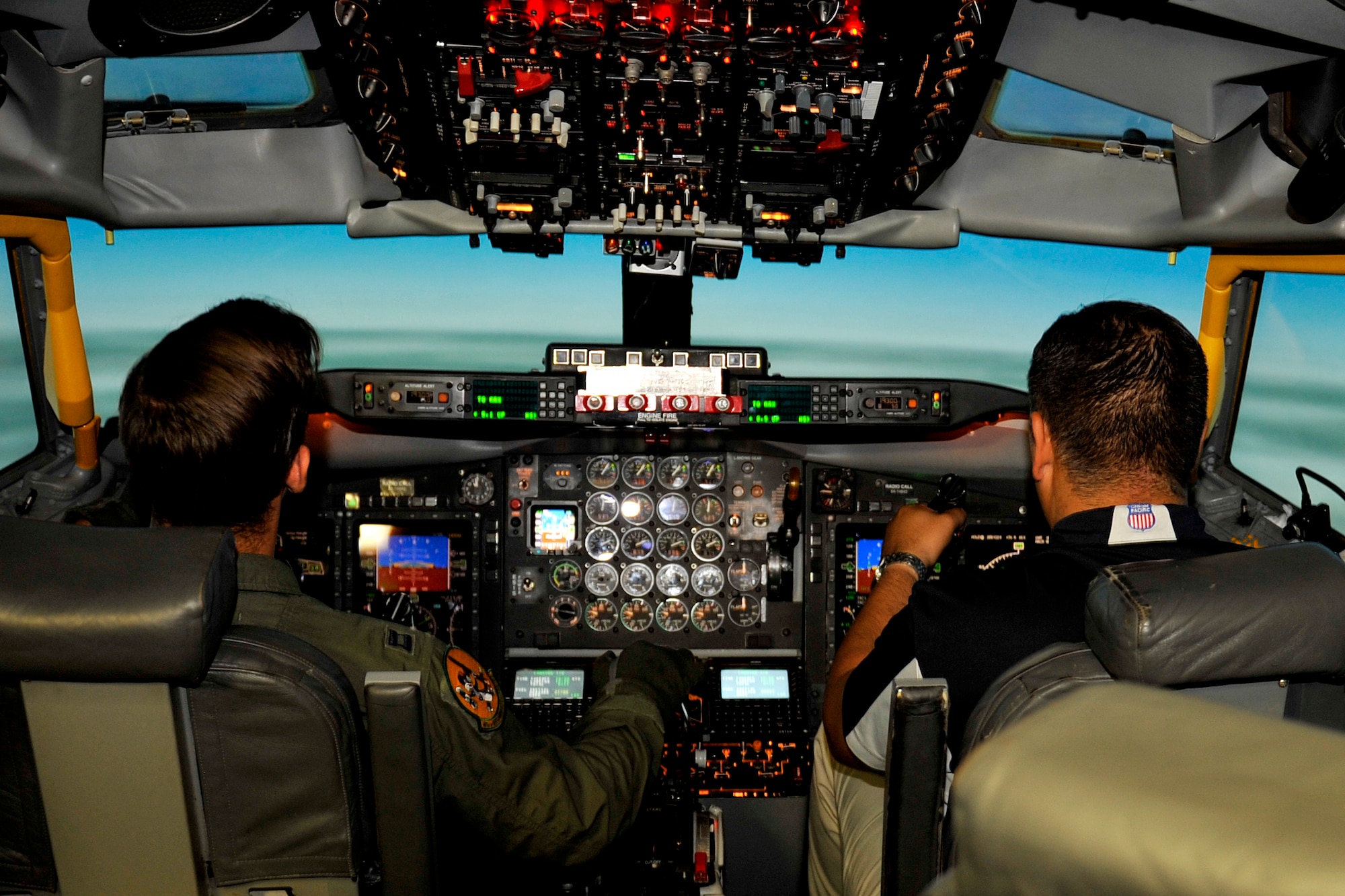 A Union Pacific team member flies participates in a simulator flight during a tour of Offutt Air Force Base, Nebraska, July 29. The visiting UP team members ranged in position and specialty from field managers, who directly work with train crew employees like engineers, conductors and switch persons, to executives who oversee the largest geographic area that UP operates. (U.S. Air Force photo by Jeff Gates/Released)