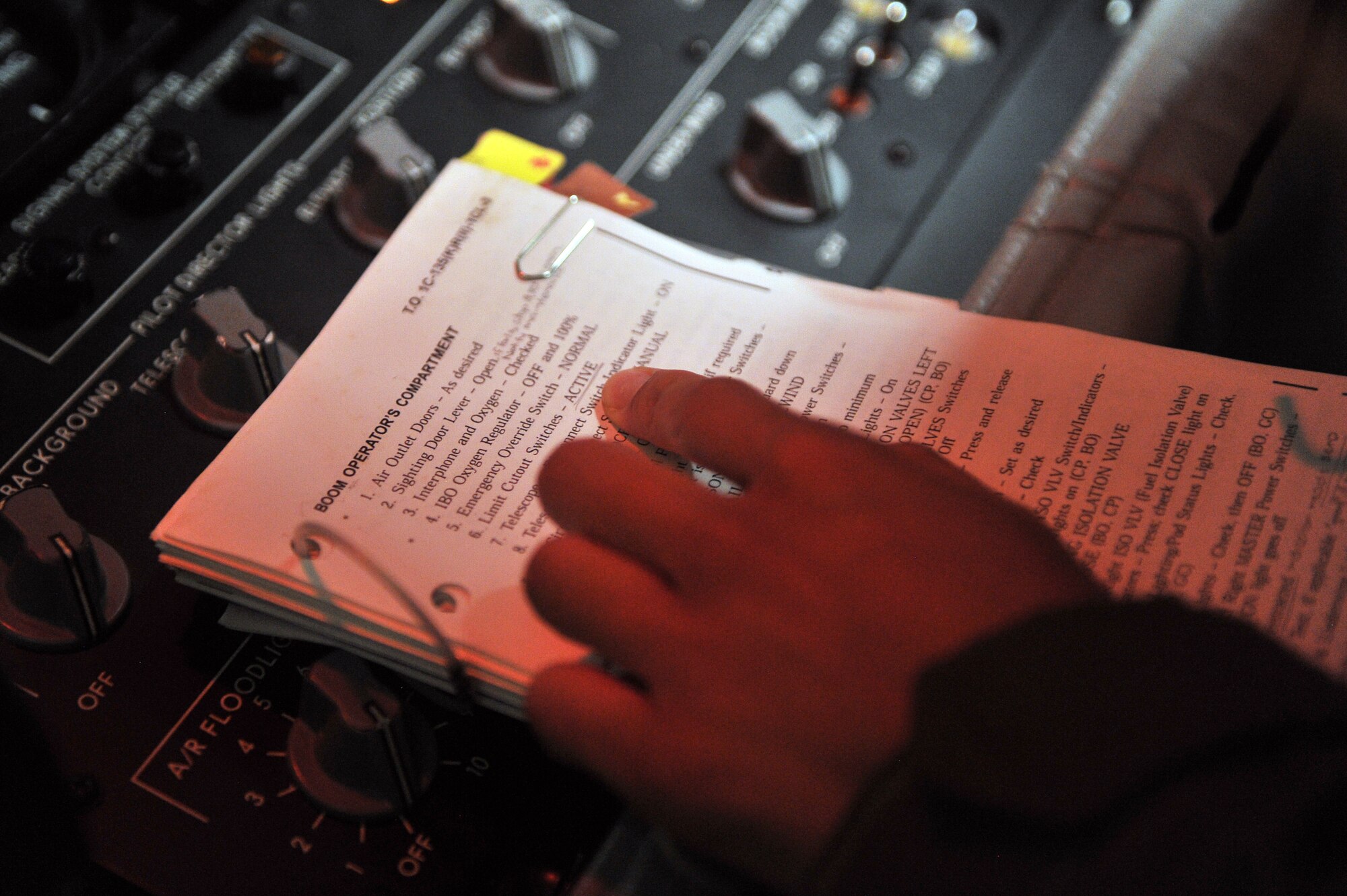 ALTUS AIR FORCE BASE, Okla. – U.S. Air Force Senior Airman Mary Claire Bolo, 203rd Air Refueling Squadron boom operator student, Hawaii Air National Guard, reviews a pre-flight checklist before starting a U.S. Air Force KC-135 Stratotanker refueling aircraft Boom Operator Weapons System Trainer simulation, July 30, 2015. During KC-135 boom operator training, students must complete 16 BOWST simulations before they take to the skies to train aboard a real aircraft. (U.S. Air Force photo by Senior Airman Dillon Davis/Released)