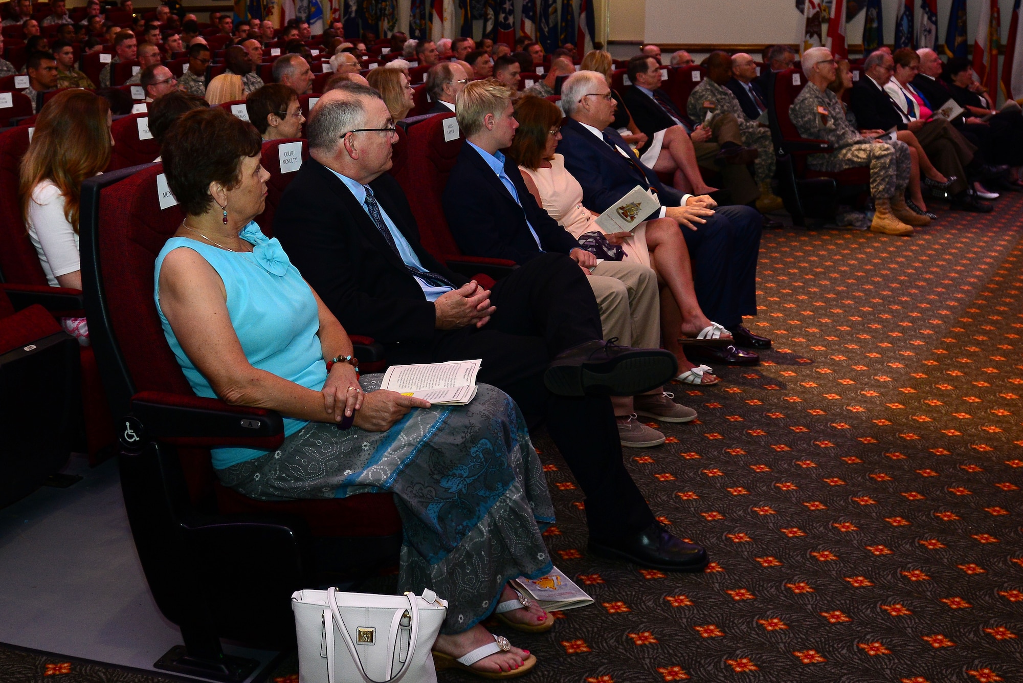 Family, friends and other U.S. Army Transportation Corps members listen as U.S. Army Col. Michel Russell Sr., U.S. Army Transportation Corps chief, speaks during a Hall of Fame induction ceremony at Fort Eustis, Va., July 30, 2015. The ceremony honored six nominees who exceeded standards in accordance with Regimental Standing Operating Procedures. (U.S. Air Force photo by Senior Airman Kimberly Nagle/Released)