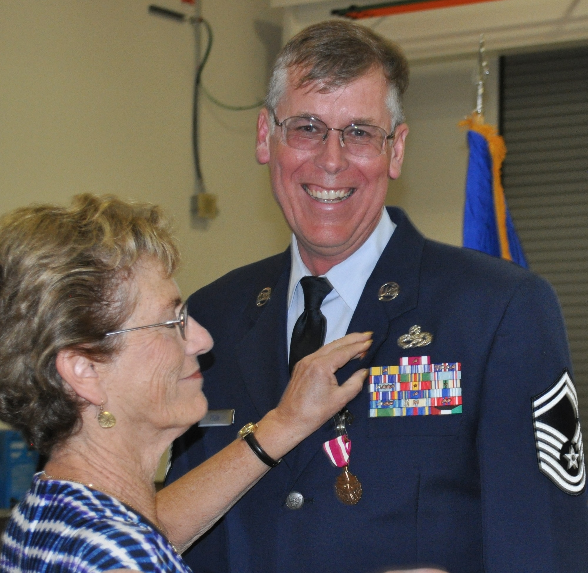TRAVIS AIR FORCE BASE, Calif. -- The 349th Air Mobility Wing maintenance community turned out to honor Senior Master Sgt. Richard "Randy" Robb at his retirement July 25, 2015, after serving 33 years. (U.S. Air Force photos/Ellen Hatfield)