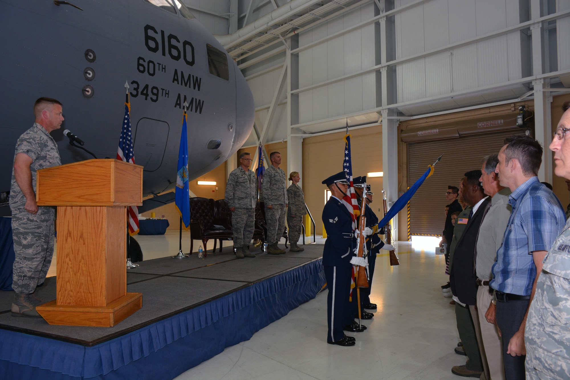 TRAVIS AIR FORCE BASE, Calif. -- Lt. Col. Joseph R. Orcutt relinquishes command of the 945th Aircraft Maintenance Squadron to Lt. Col. Arianne Mayberry, formerly the commander of the 349th Maintenance Operations Section, July 25, 2015 on Travis Air Force Base. (U.S. Air Force photos/Senior Airman Madelyn Brown)
