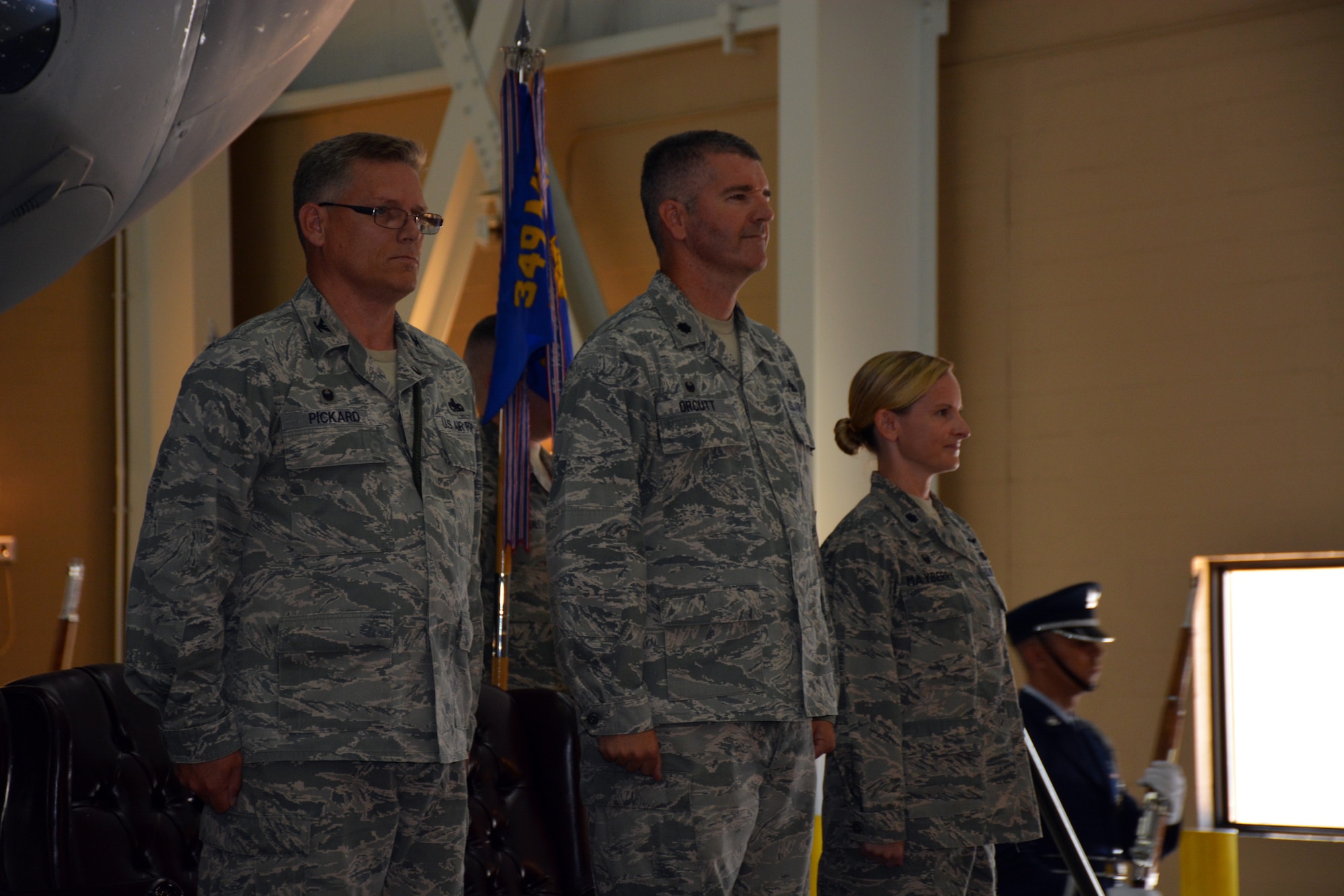 TRAVIS AIR FORCE BASE, Calif. -- Lt. Col. Joseph R. Orcutt relinquishes command of the 945th Aircraft Maintenance Squadron to Lt. Col. Arianne Mayberry, formerly the commander of the 349th Maintenance Operations Section, July 25, 2015 on Travis Air Force Base. (U.S. Air Force photos/Senior Airman Madelyn Brown)
