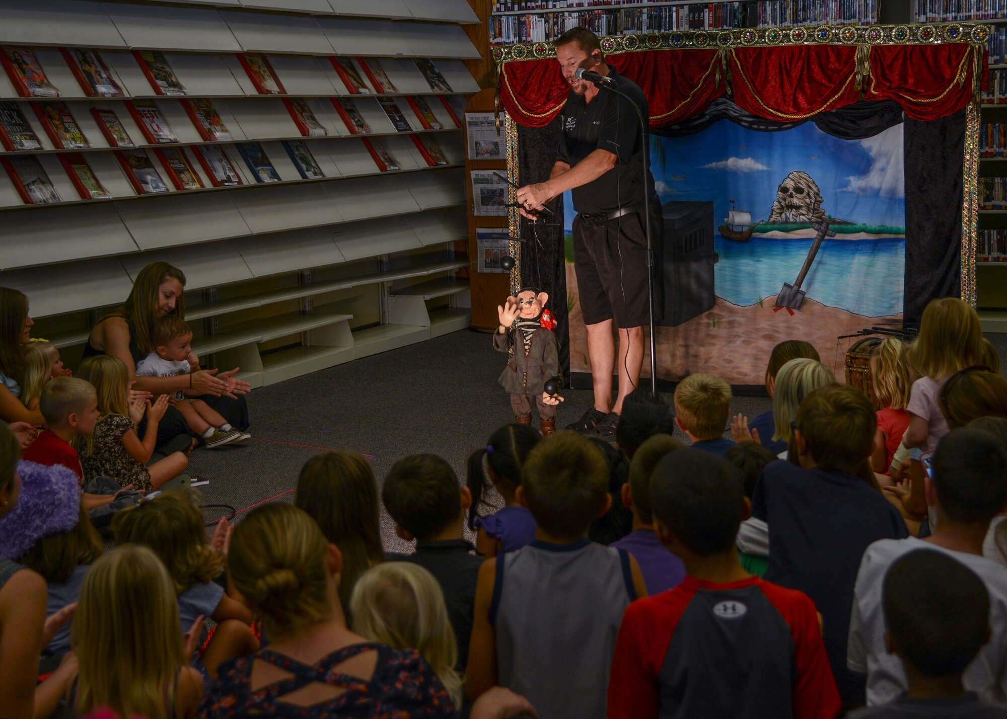 Happy juggles cannonballs as he tries to help free Princess Rachel. (U.S. Air Force photo by Rebecca Amber)