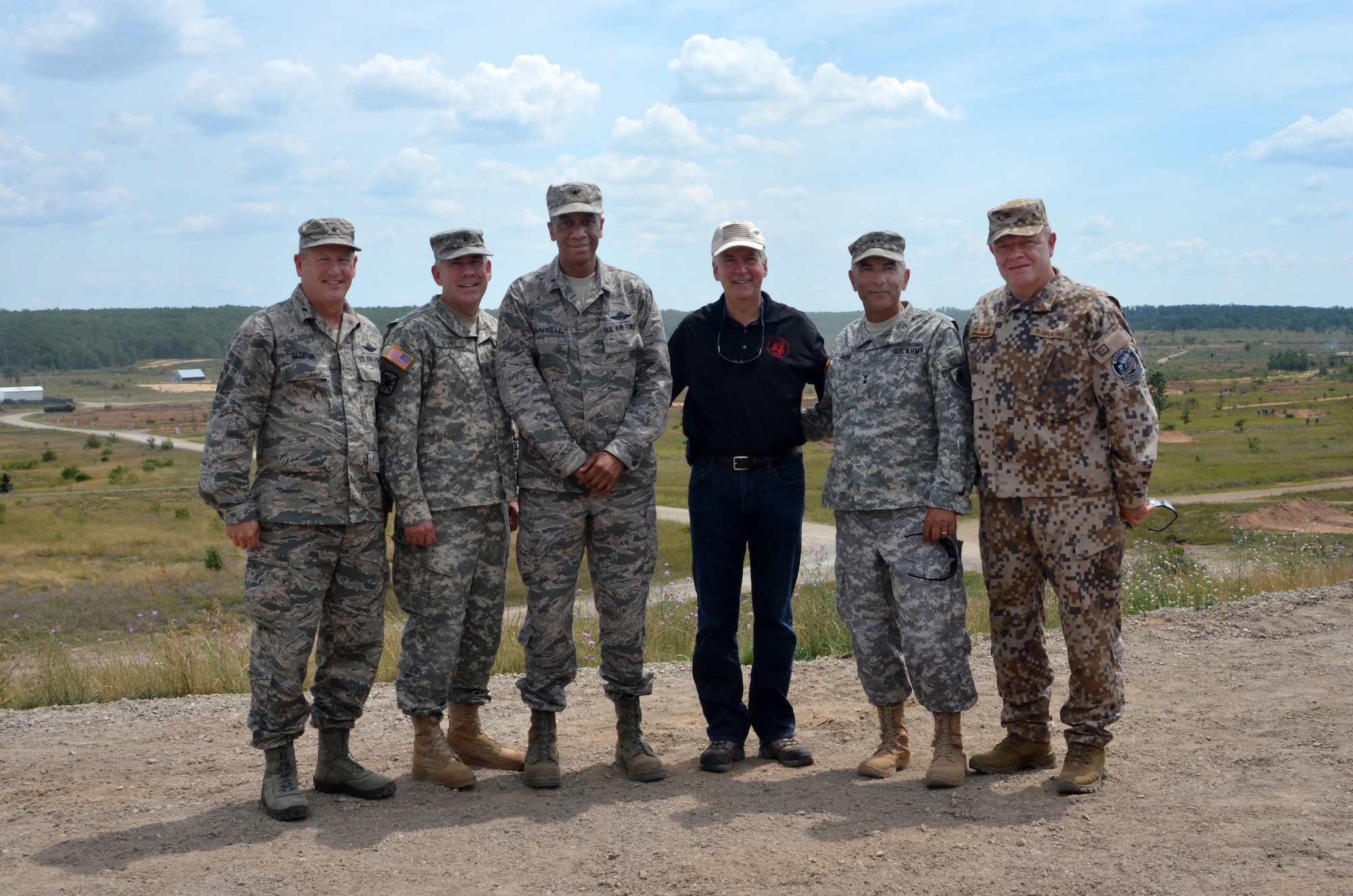Brig. Gen. John Slocum, commander of the 127th Wing, Selfridge Air National Guard Base Brig. Gen. Mike Stone, assistant adjutant general - Installations Brig. Gen. Leonard Isabelle, commander of the Michigan Air National Guard, Michigan Governor Rick Snyder, Maj. Gen. Gregory Vadnais, adjutant general for the Michigan National Guard Lt. Gen. Raimonds Graube, chief of Latvian defense to observe Northern Strike 15, a major combat training exercise that brings ground and air combat units from four coalition countries and more than 20 states to training locations across northern Michigan. (Michigan National Guard photo by Sgt. 1st Class Helen Miller/Released)
