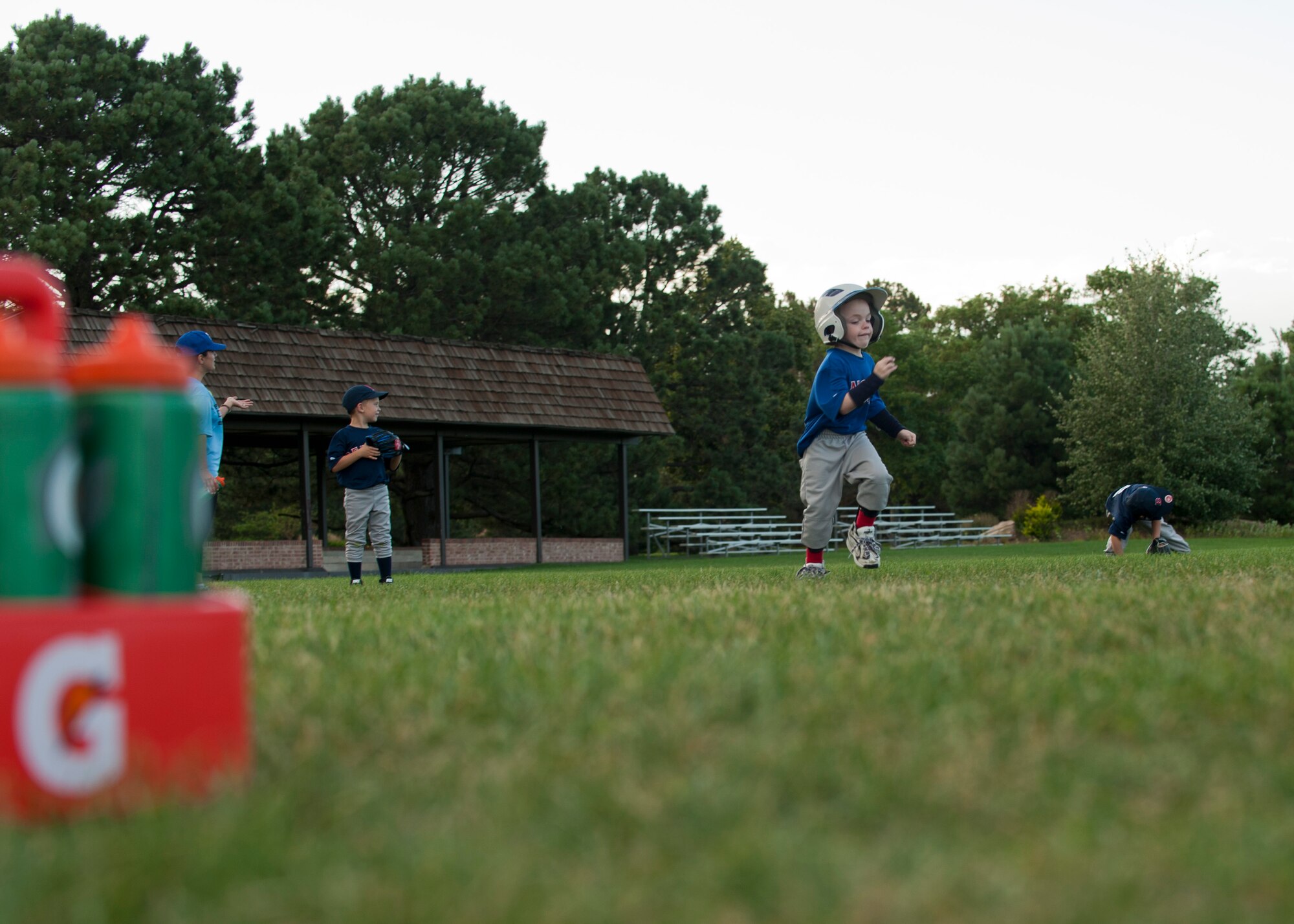 PETERSON AIR FORCE BASE, Colo. –  Brecken Levy, 6, speeds to home plate in a game of t-ball at Patriot Park, July 28, 2015. He has periventricular leukomalacia, which resulted in cerebral palsy, but he doesn’t let that stop him. The sports program at the R.P. Lee Youth Center includes him as well as anyone else who may have special needs and want to get involved in sports, just like other kids. (U.S. Air Force photo by Airman 1st Class Rose Gudex)