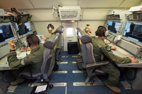 U.S. Airmen with the 12th Airborne Command and Control Squadron, perform pre-flight ops checks on an E-8C Joint STARS in preparation for a mission during the Northern Strike 2015 combat exercise, Robins Air Force Base, Ga., July 29, 2015. Team JSTARS joined military forces from more than 20 states and four coalition countries for the exercise hosted by the Michigan National Guard. Working with a liaison officer from the 116th Air Control Wing (ACW), Georgia Air National Guard, deployed to the exercise headquarters in Michigan, aircrews flying out of Robins Air Force Base from the 461st ACW and the Army JSTARS provided real-time tracking information to air and ground forces helping them to find and identify enemy forces played by exercise participants. (U.S. Air National Guard photo by Senior Master Sgt. Roger Parsons/Released) (Portions of the photo have been blurred for security purposes)