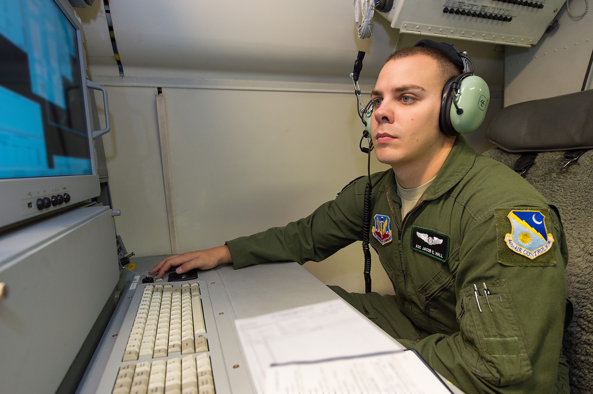 U.S. Air Force Airman 1st Class Jacob Hall, a radar technician with the 12th Airborne Command and Control Squadron, performs an ops check on the radar system of an E-8C Joint STARS in preparation for a mission during the Northern Strike 2015 combat exercise, Robins Air Force Base, Ga., July 29, 2015. Team JSTARS joined military forces from more than 20 states and four coalition countries for the exercise hosted by the Michigan National Guard. Working with a liaison officer from the 116th Air Control Wing (ACW), Georgia Air National Guard, deployed to the exercise headquarters in Michigan, aircrews flying out of Robins Air Force Base from the 461st ACW and Army JSTARS provided real-time tracking information to air and ground forces helping them to find and identify enemy forces played by exercise participants. (U.S. Air National Guard photo by Senior Master Sgt. Roger Parsons/Released) (Portions of the photo have been blurred for security purposes)

