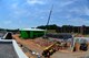 McGHEE TYSON AIR NATIONAL GUARD BASE, Tenn. - A front loader dumps fill-gravel here, August 4, 2015,at the footings of dormitory building 