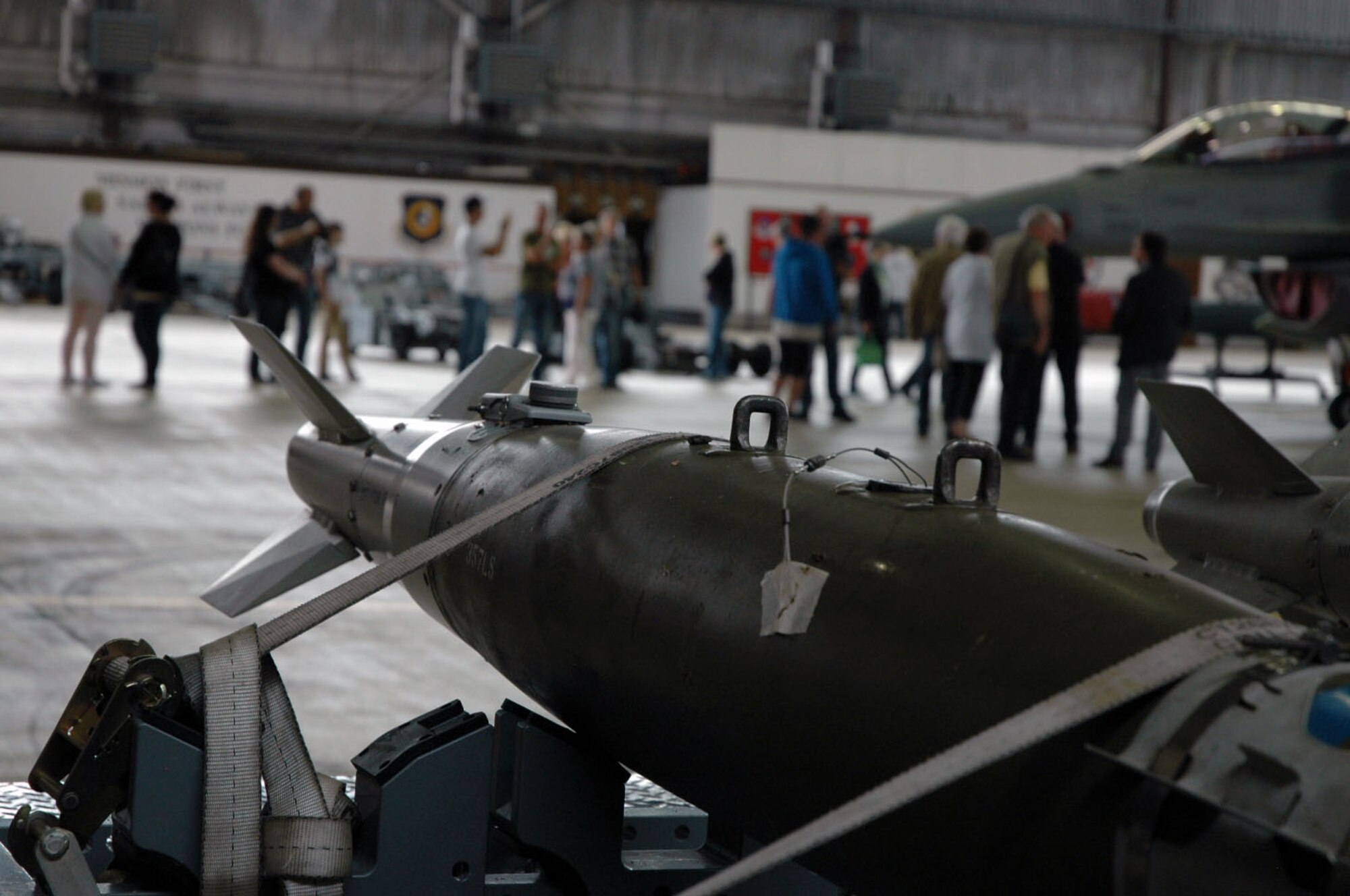 Weapons are on display at a Hangar One during a visit by members from the Freundeskreis der Luftwaffe e.V. Association to Spangdahlem Air Base, Germany, July 13, 2015.The tour included sections of the 726th Air Mobility Squadron as well as sites from the 52nd Fighter Wing. (U.S. Air Force photo by Iris Reiff/Released)