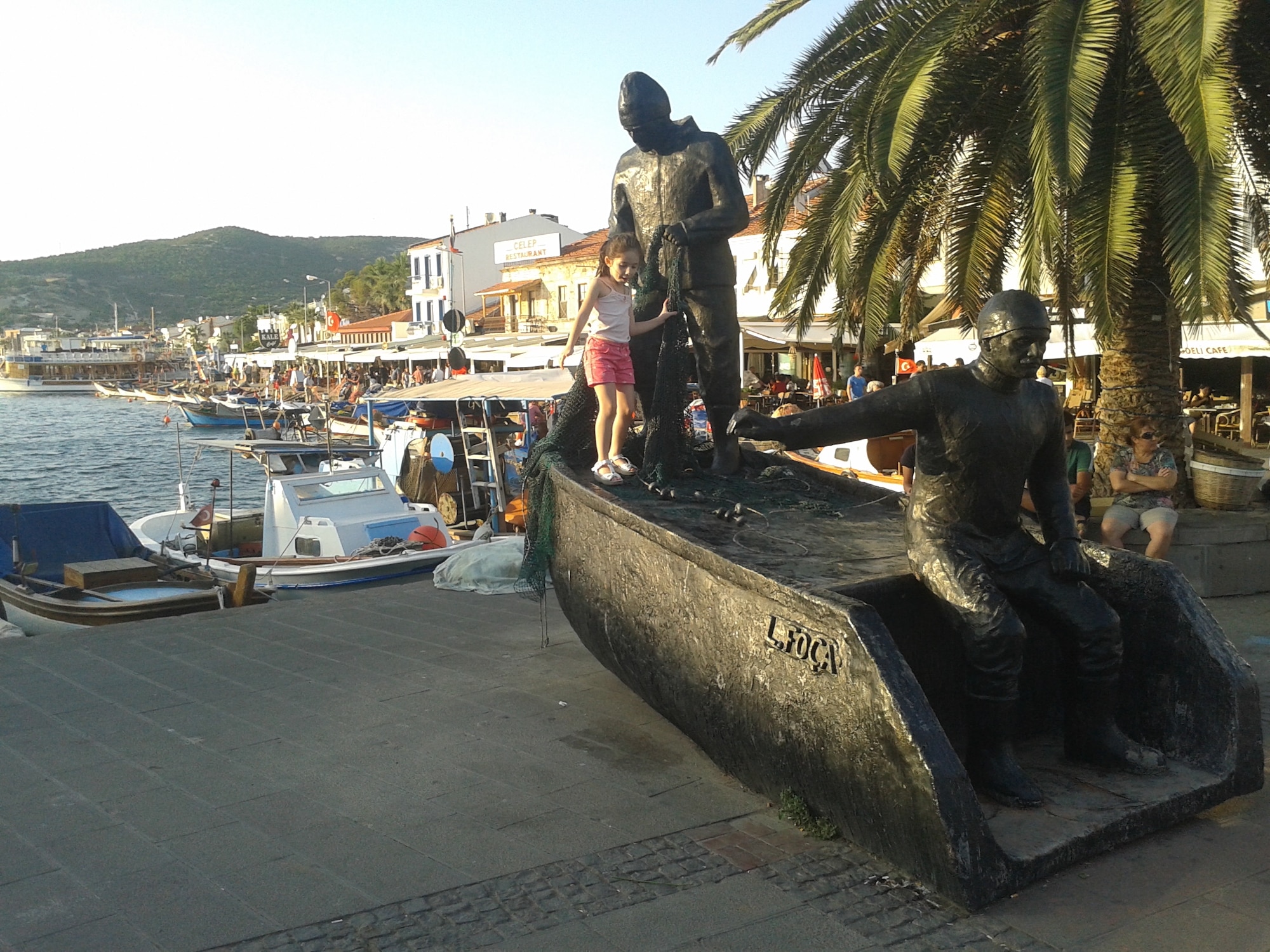 A view from Eski Foça by the entry to the Küçükdeniz Harbor where fish restaurants, discos, shops, bars and recreational areas are lined up along the shore. (U.S. Air Force photo by Tanju Varlikli)