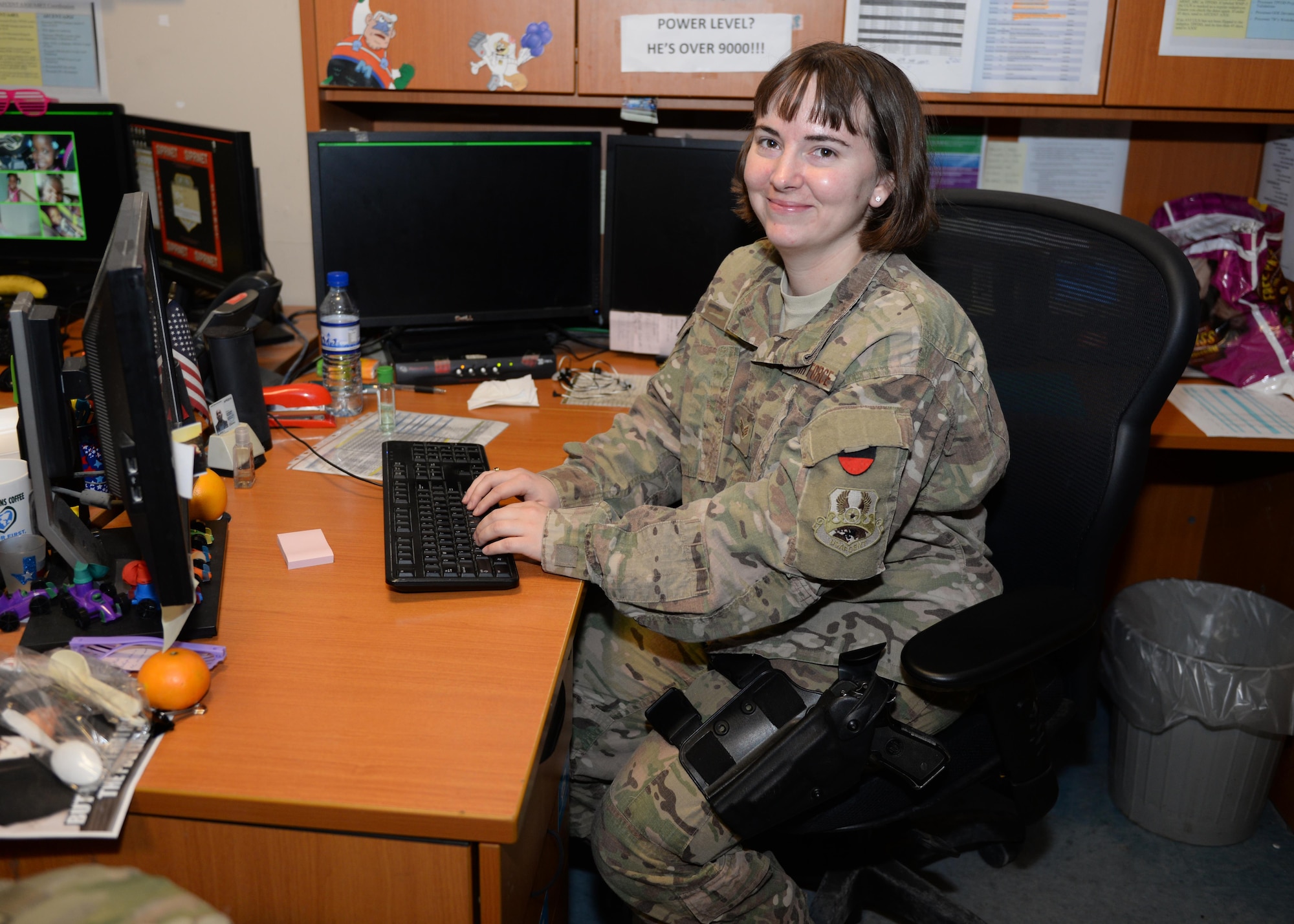 U.S. Air Force Senior Airman Sheral Bair, 455th Expeditionary Logistics Readiness Squadron log planner, works on passenger terminal schedules Aug. 4, 2015, at Bagram Airfield, Afghanistan. Bair is a member of the PAX terminal team who is responsible for ensuring all Bagram Airmen redeploy back to home station when they reach the end of their tour here. (U.S. Air Force photo by Senior Airman Cierra Presentado/Released)