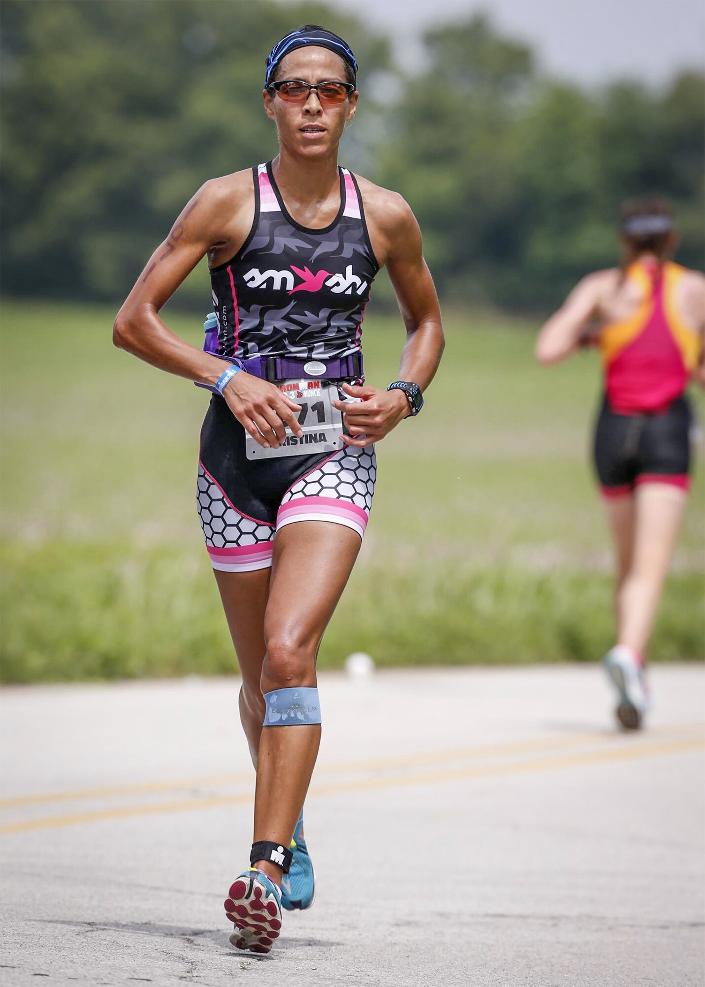 Maj. Christina Hopper runs during the Ironman 70.3 Muncie at Muncie, Indiana, July 11. Hopper completed her 13.1-mile run in 1:46:40. (Courtesy photo by finisherpix)