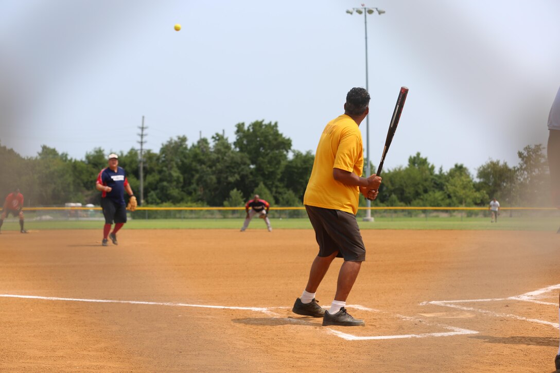 Richard Beverly stands at the plate waiting to ht the ball during the championship game of the base softball game. (U.S. Marine Corps photo by Cpl. Logan Snyder/Released)
